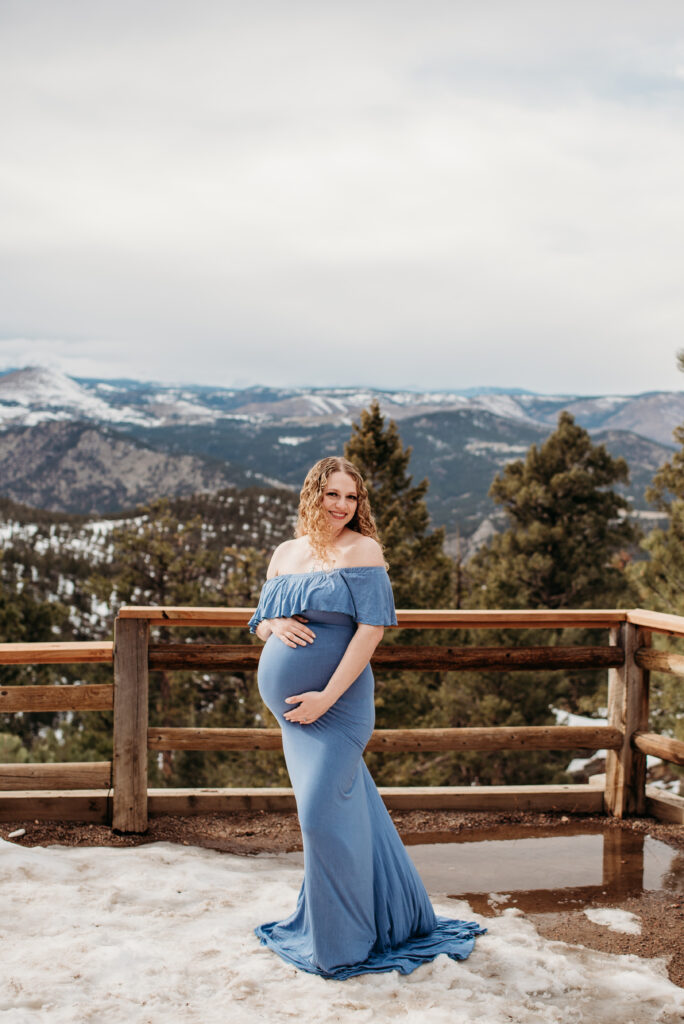 Pregnancy photography in the mountains. Blue dress. Boulder Colorado