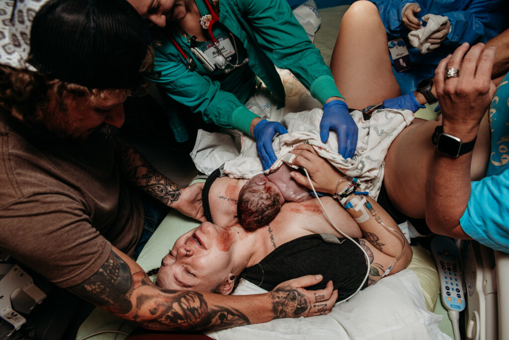 Hospital birth photo in NoCo baby placed on moms chest after birth