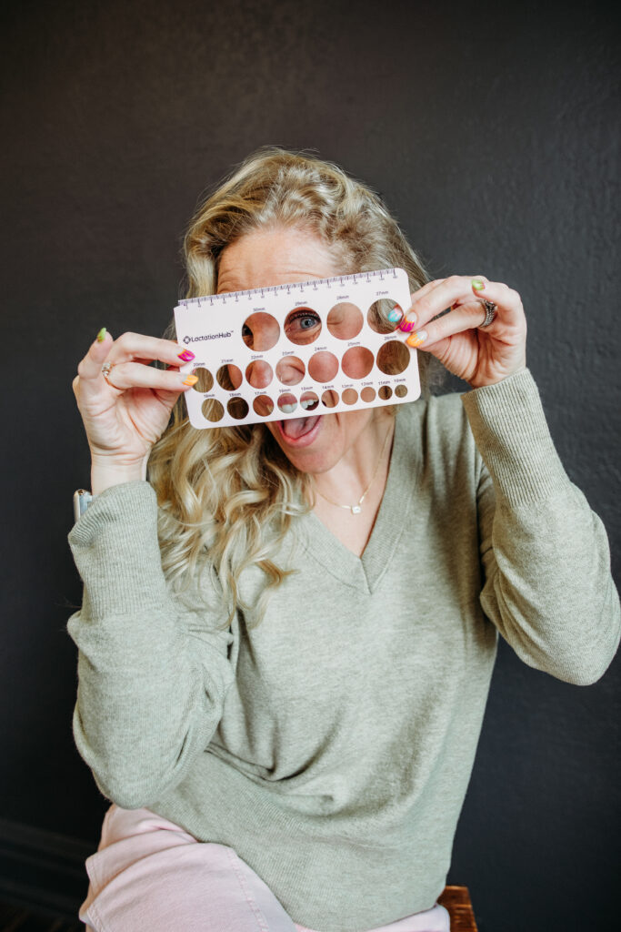 NoCo IBCLC lactation support. Woman holding flange size guide. IBCLC branding photos.