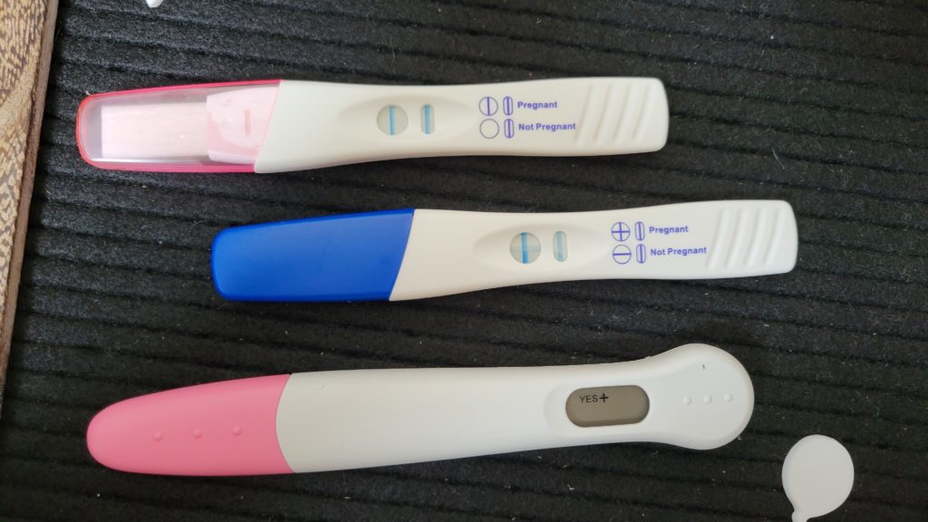 Three different positive pregnancy tests