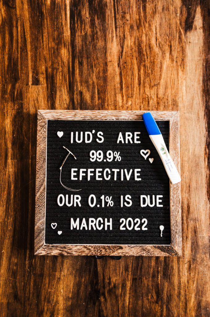 letter board says "IUD's are 99.9% effective. Our 0.1% is due March 2022" with a positive pregnancy test