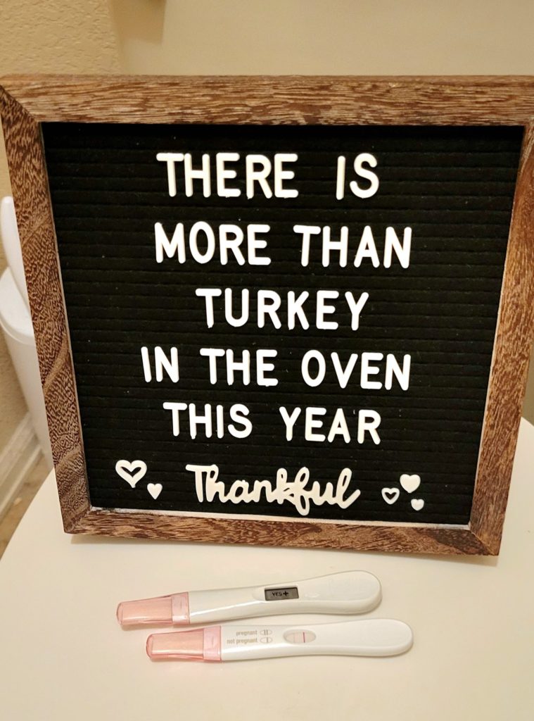 Thanksgiving letterboard pregnancy announcement. There is more than turkey in the oven this year. Thankful. Photo of positive pregnancy tests