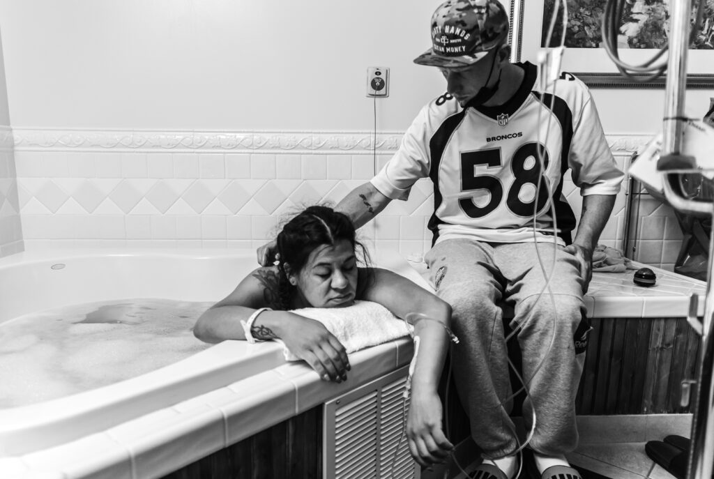 photo of mama laboring in a hospital labor tub at Avista Hospital Colorado