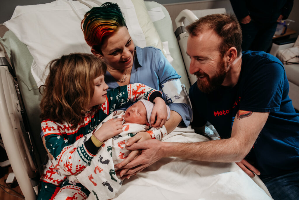 First family photo after the birth story of their little boy.