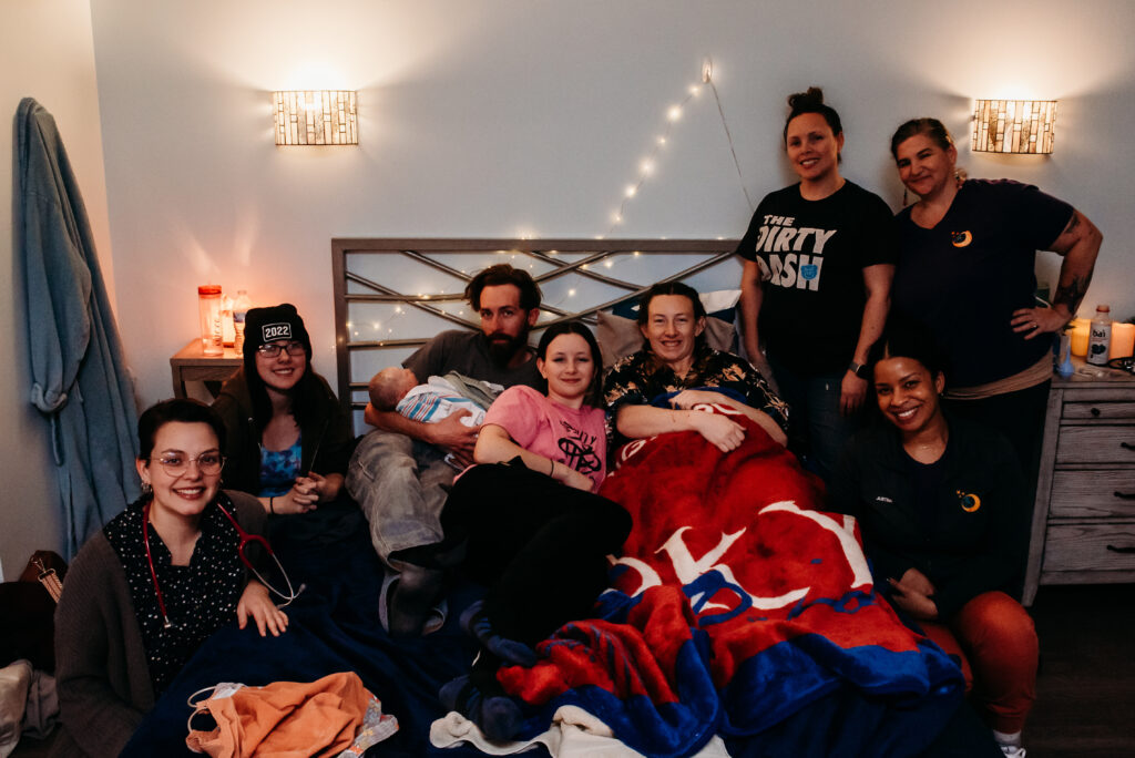 Group photo at Seasons birth center in Thornton CO after the birth of a baby