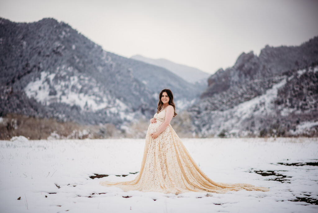 lace dress snowy maternity photo boulder mountains