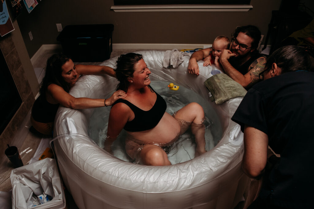 Home birth photo with flash in Colorado