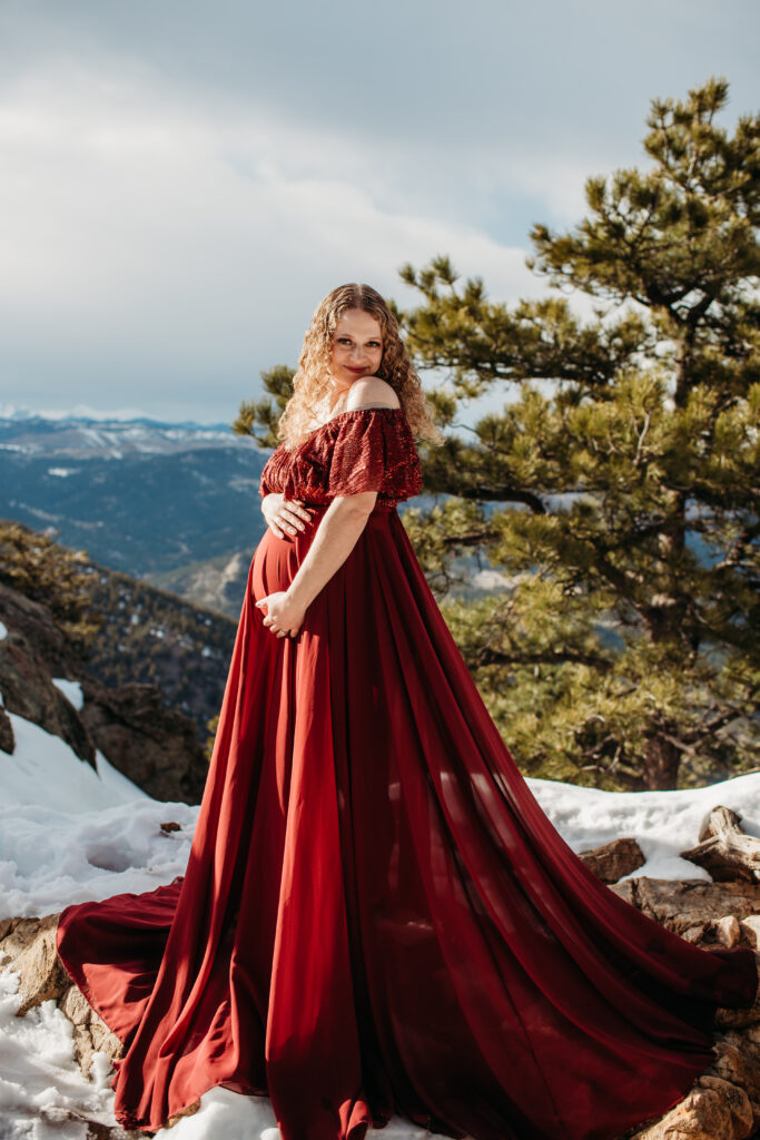 Snowy mountain maternity photo in Boulder COlorado