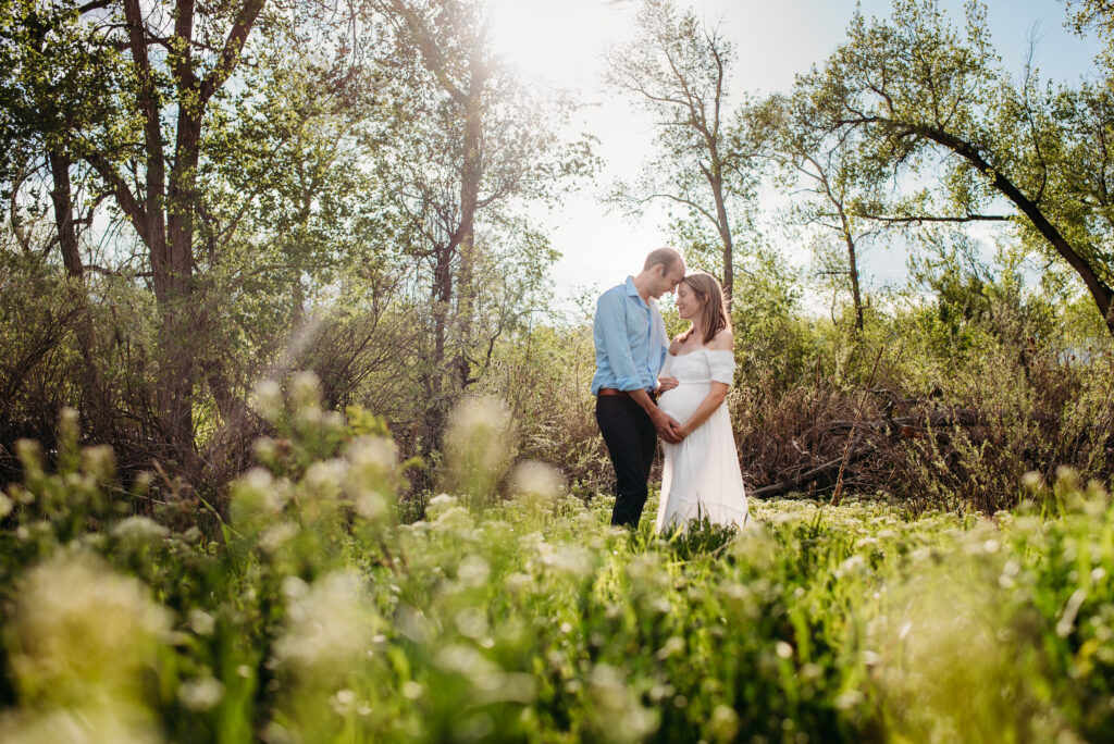 Green fields pregnancy photo in Boulder Colorado