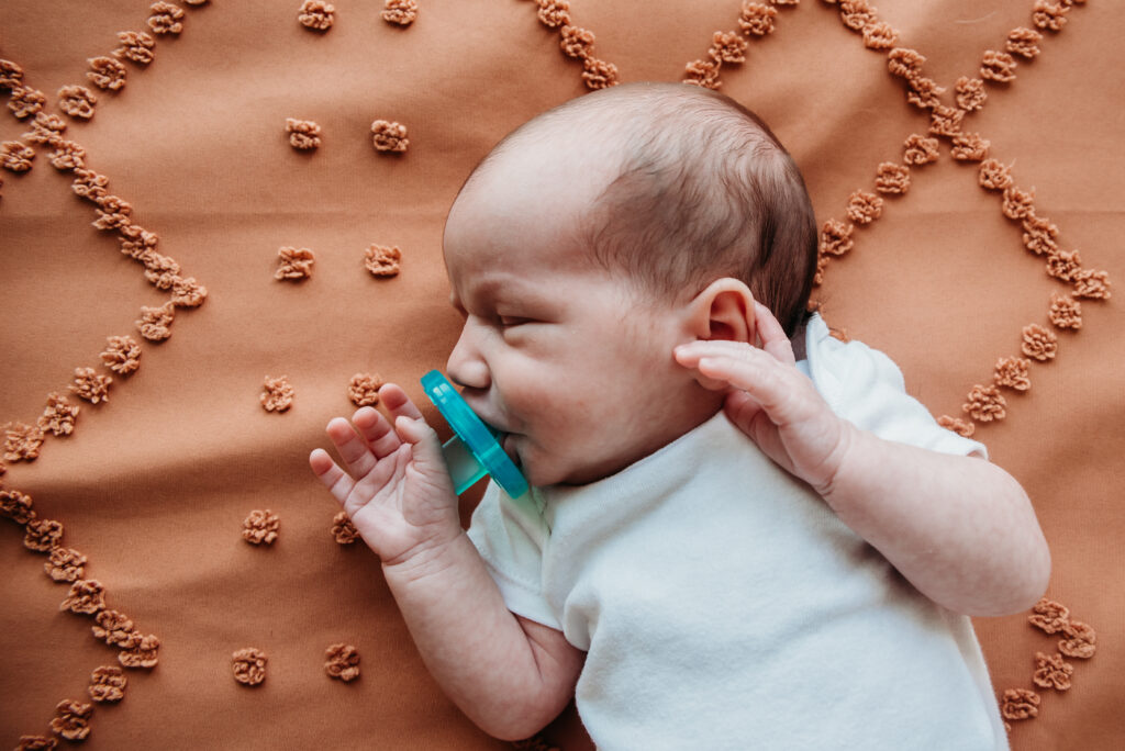 Baby with binkie photo