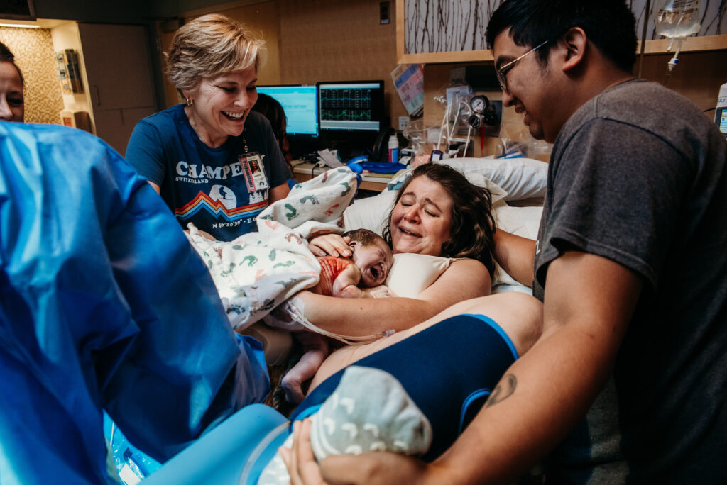 Photo of baby on mom after being born