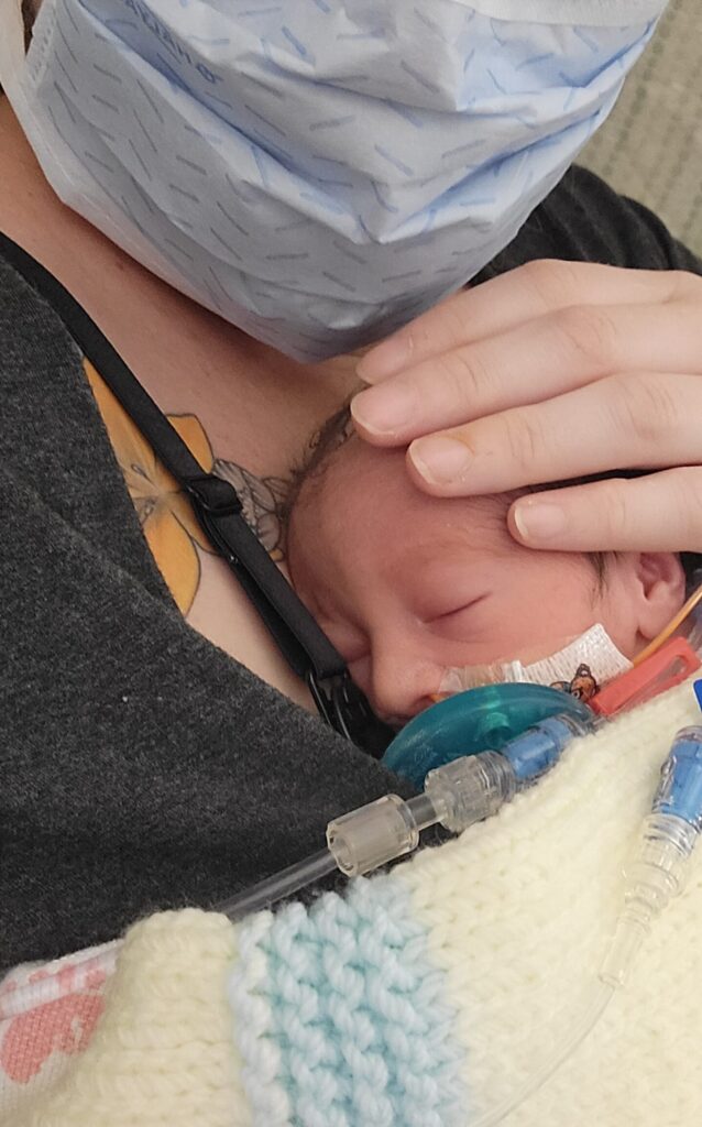 First time holding twin A at Avista Hospital in Colorado. NICU Birth Stories.