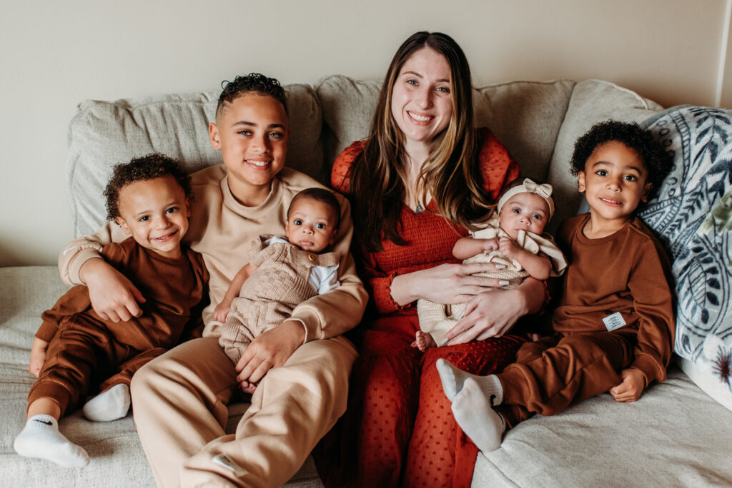 Newborn twin family photo in the living room