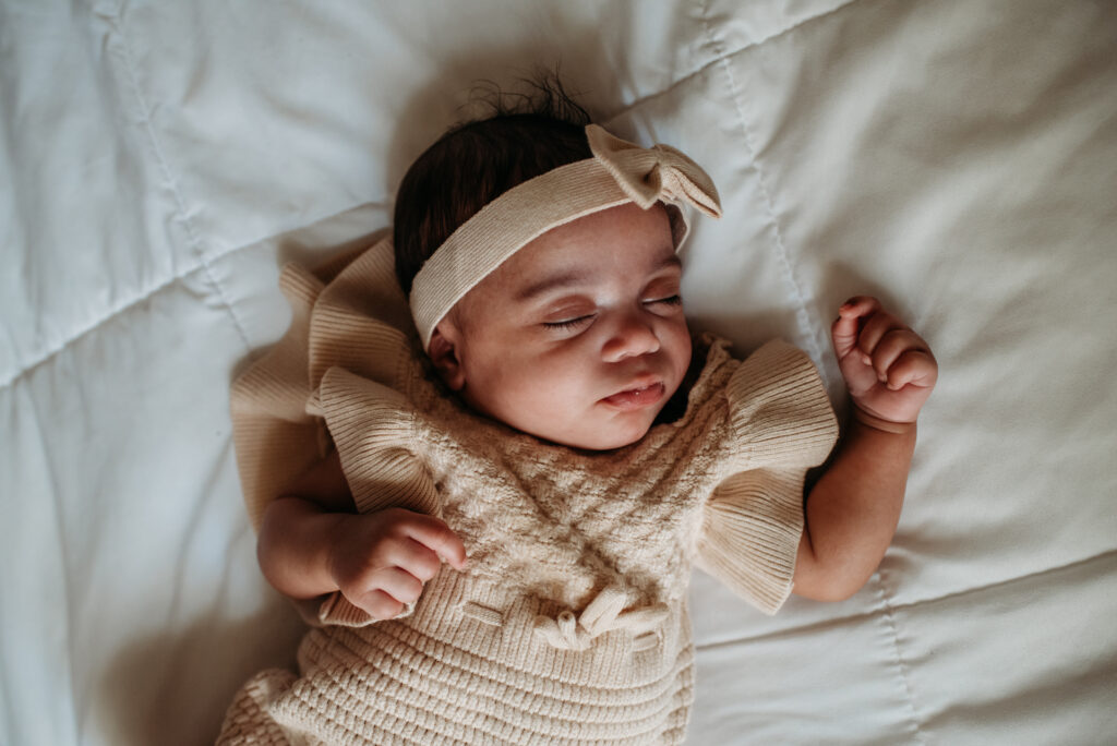 baby girl in home newborn photography