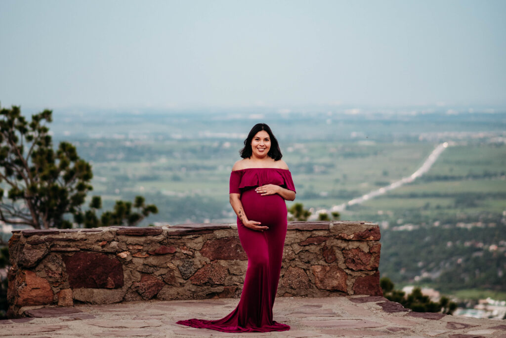 Dark pink off shoulder maternity dress photos in Boulder CO